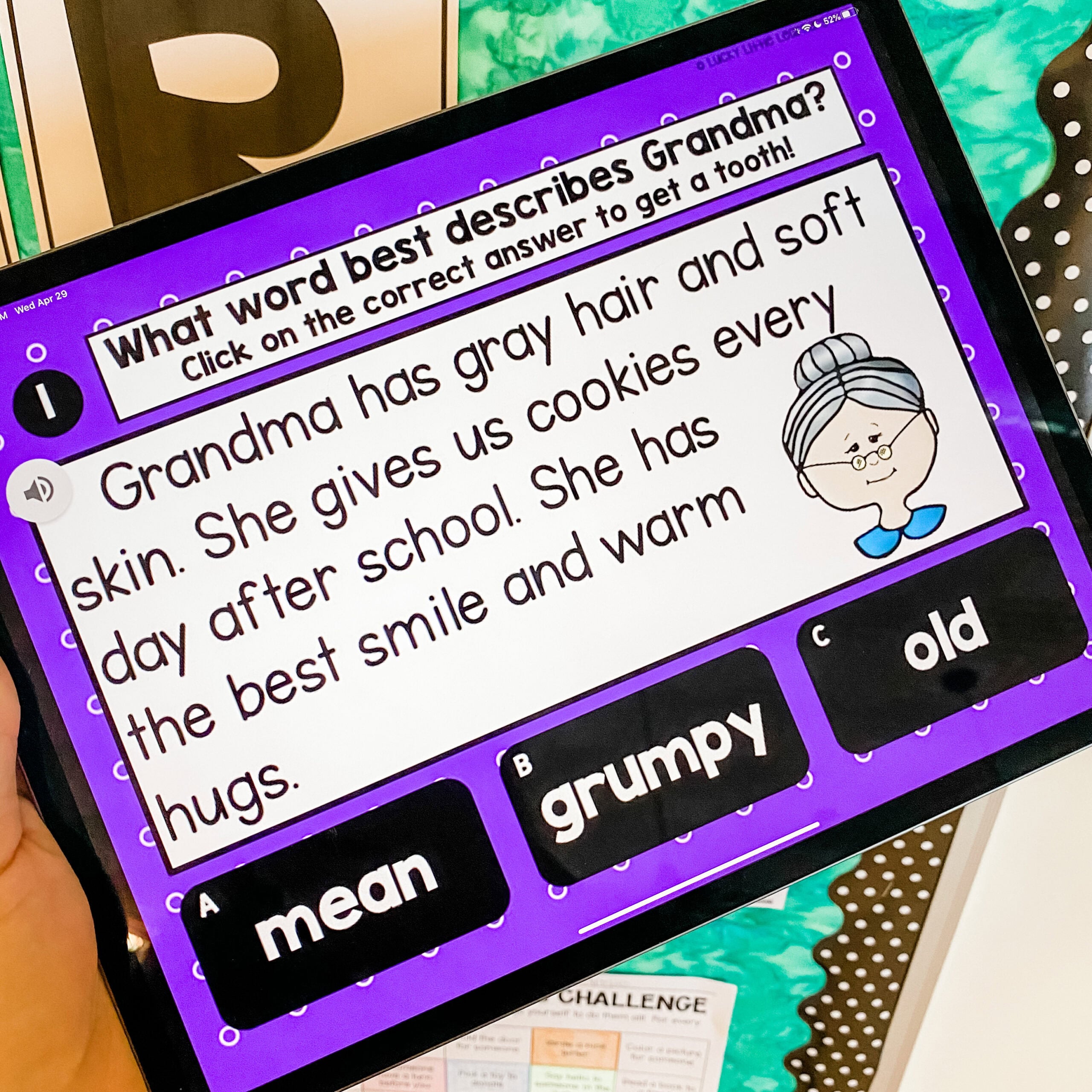 Grandma with gray hair, glasses, and a bun, smiling, holding a cookie, representing a friendly, warm character for 1st grade digital reading activities, focusing on reading comprehension and vocabula.