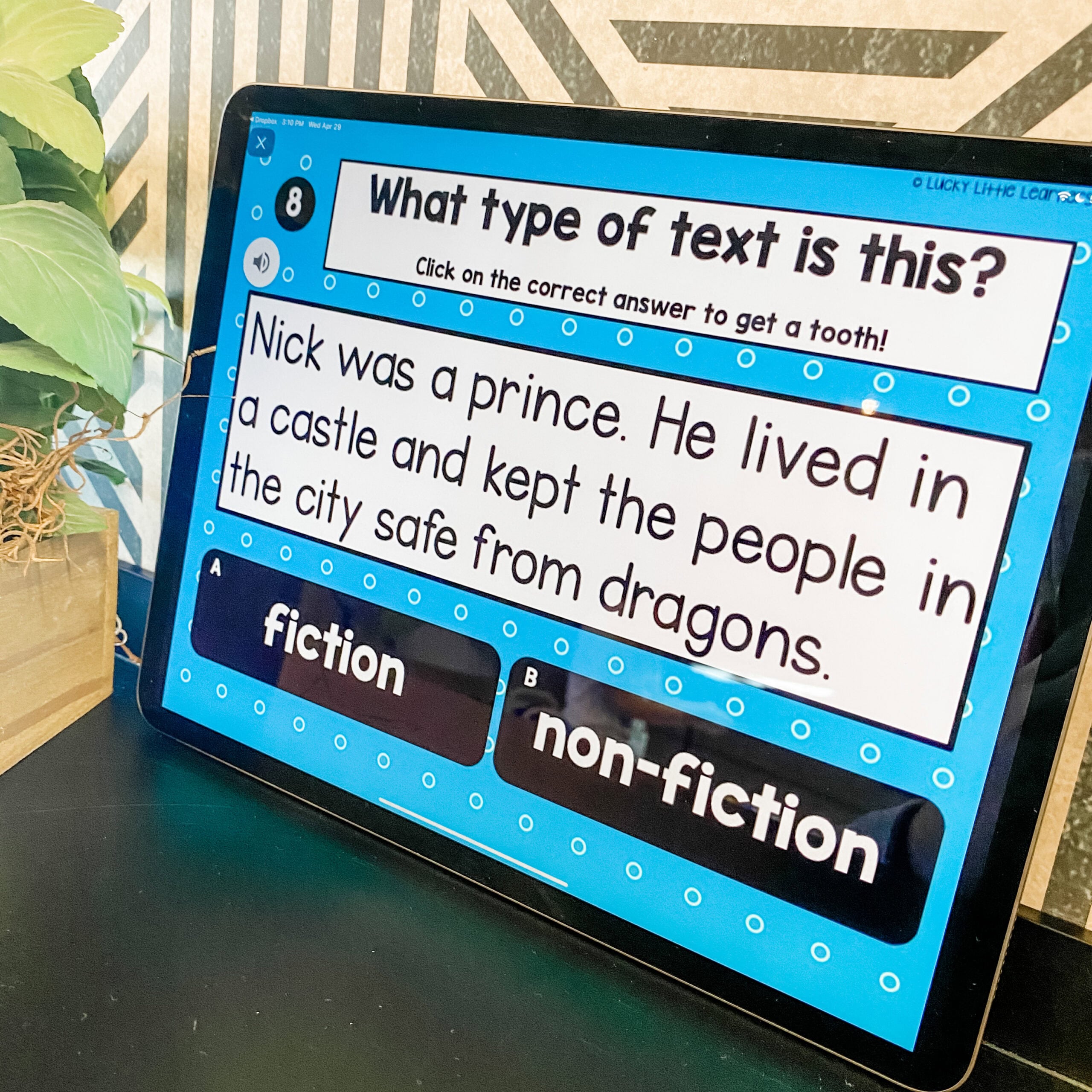 Interactive 1st grade digital reading activity on identifying text types, featuring a question about fiction and non-fiction with colorful answer options, perfect for early literacy learning.
