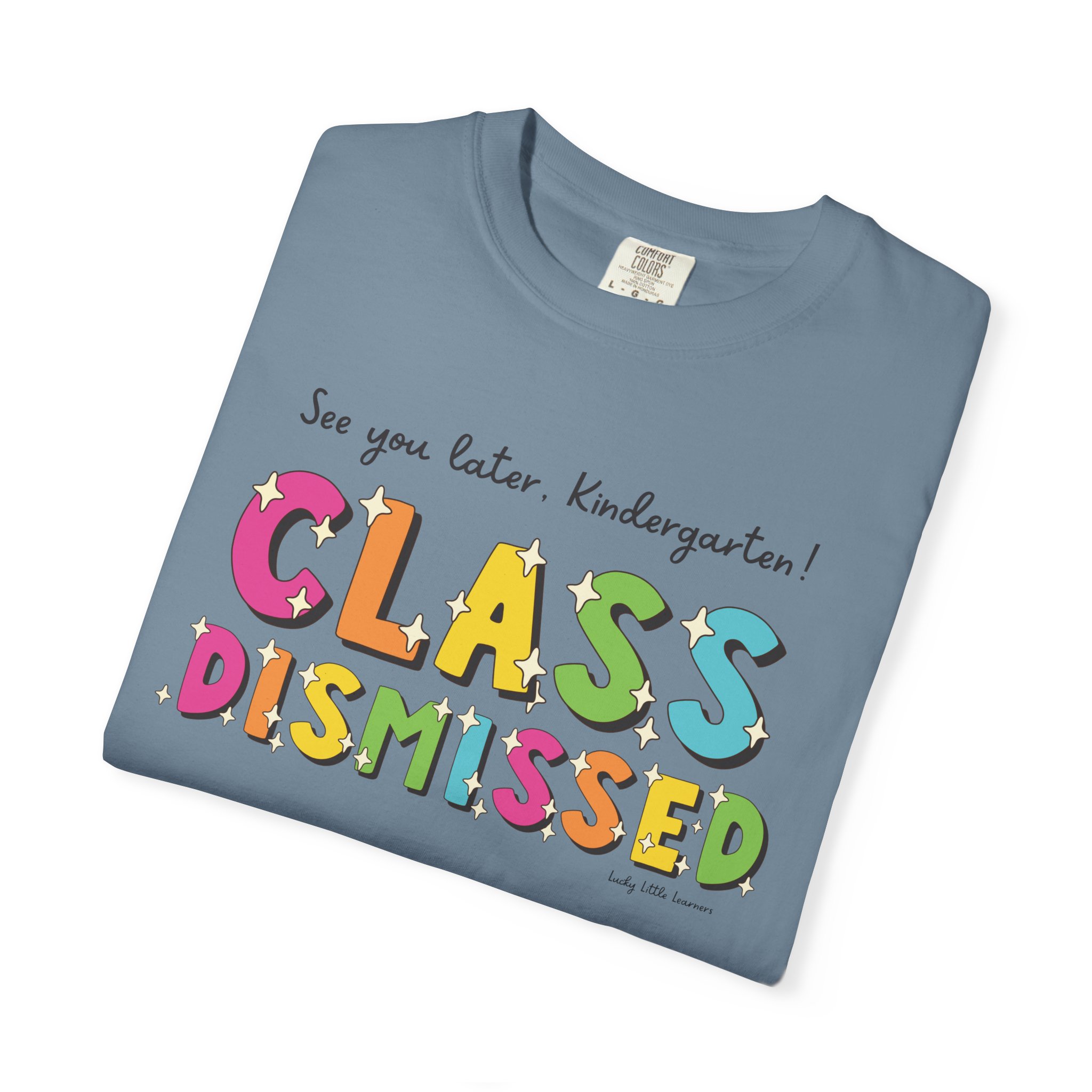 Enjoyable classroom T-shirt for kindergarten students with colorful "Class Dismissed" text and playful design, perfect for celebrating the end of the school day and encouraging early learning.