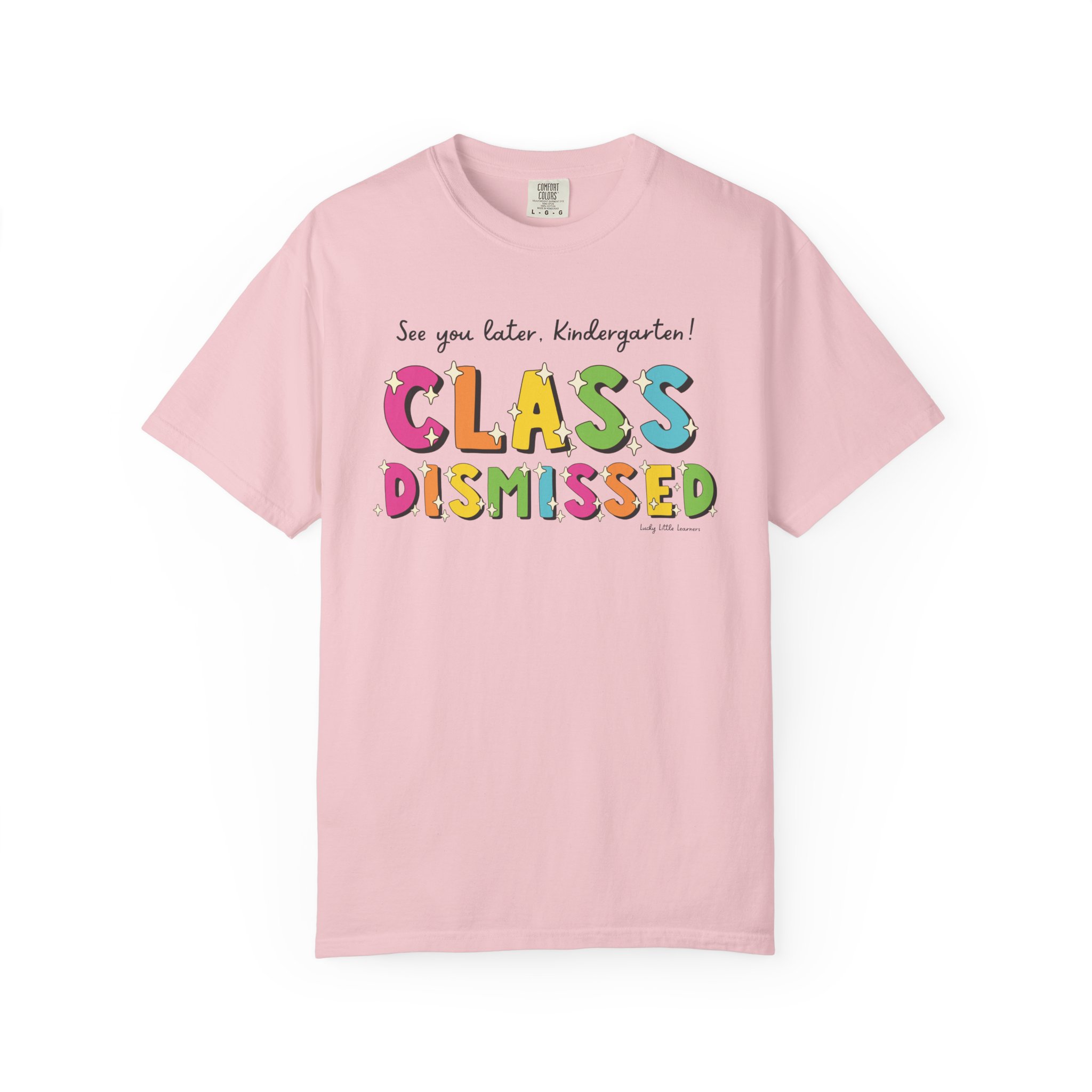 Bright pink kindergarten T-shirt with colorful "Class Dismissed" text and playful font, perfect for celebrating the end of the school year for young children.