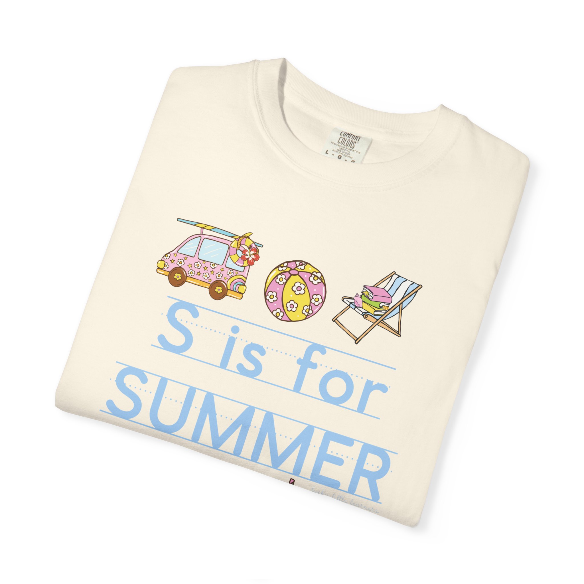A colorful "S is for Summer" teacher T-shirt featuring a car, beach ball, and lounge chair, perfect for last day of school celebrations and summer classroom activities.