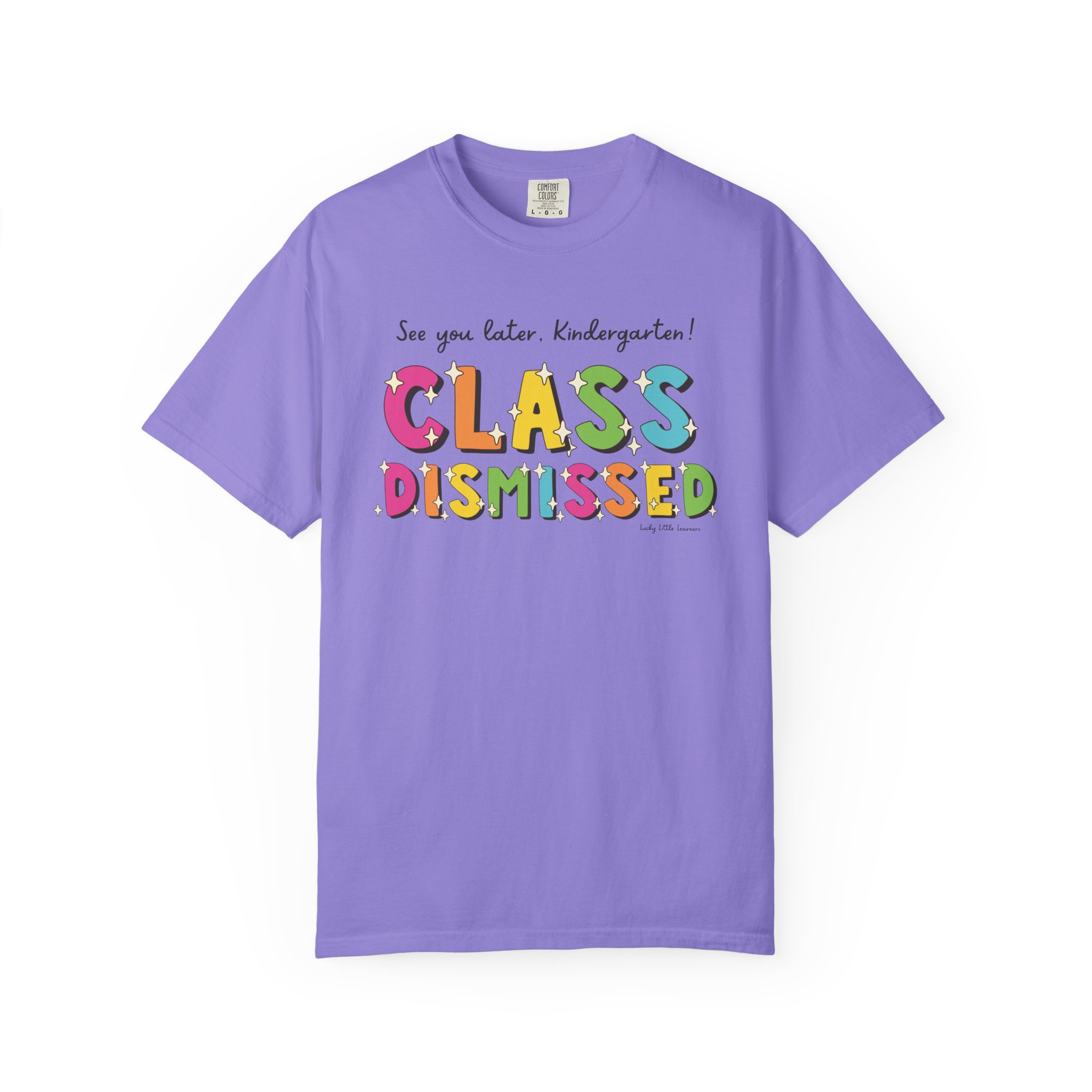 Enjoyable, colorful "Class Dismissed" kindergarten T-shirt in purple, perfect for celebrating the end of school year, featuring playful lettering and a fun, casual style for young learners.