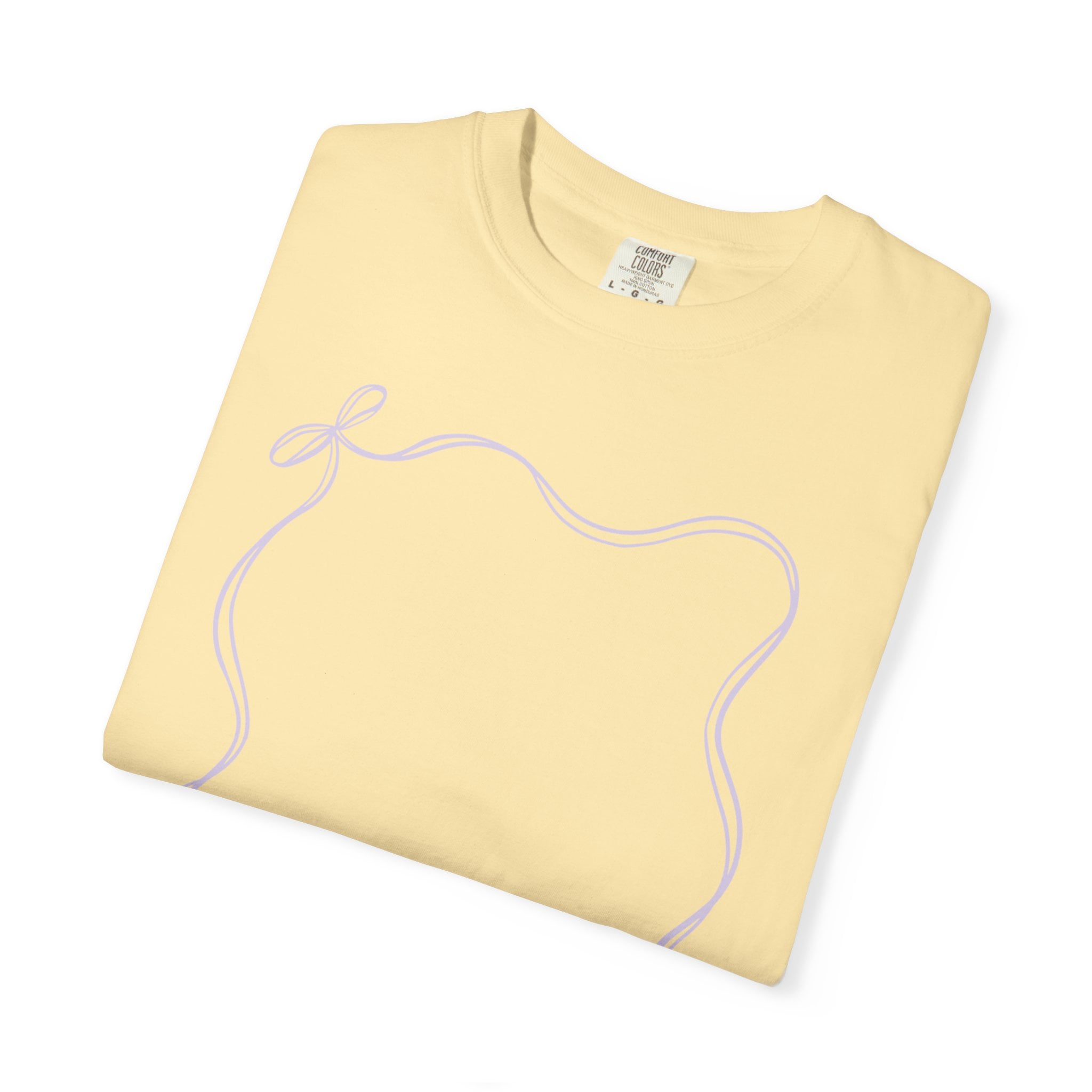 A soft yellow teacher T-shirt with a simple purple autograph-style outline of an apple, perfect for year-end teacher keepsakes and wearable memories.