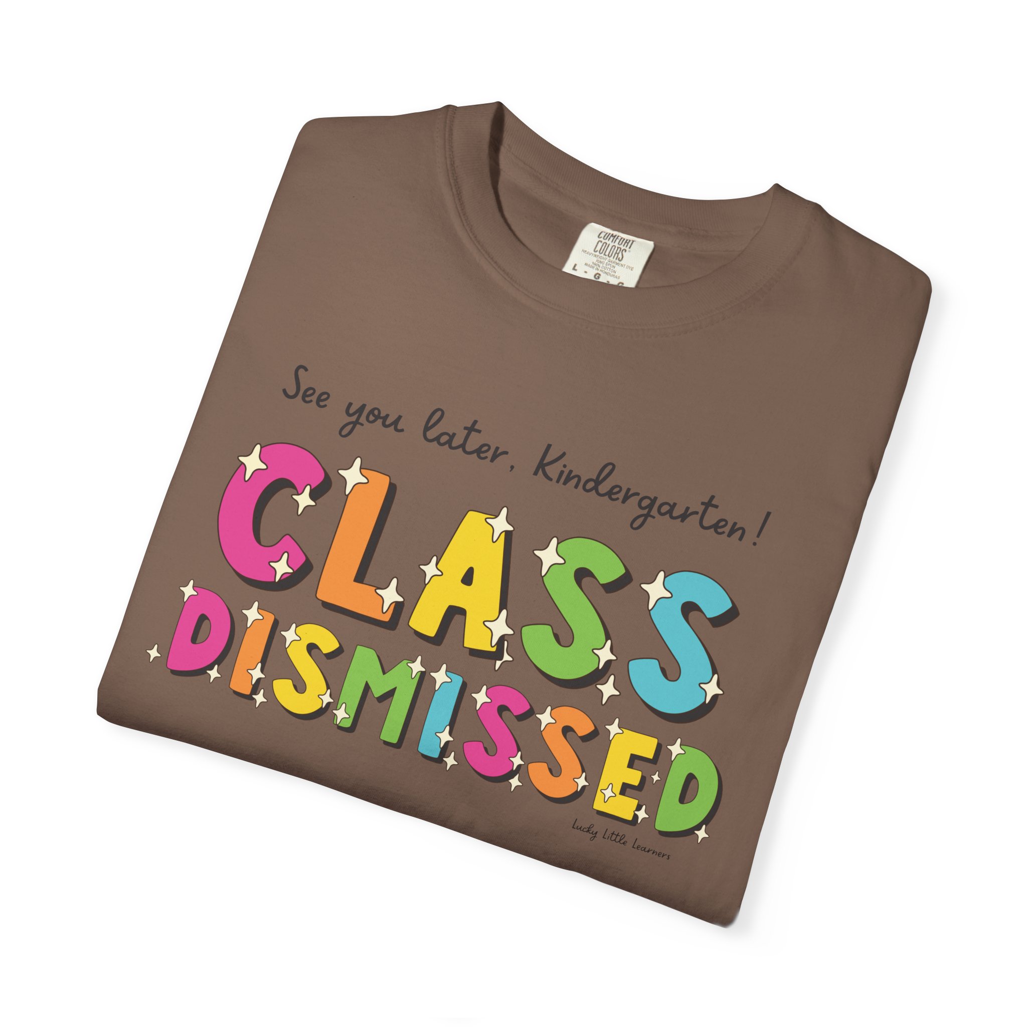 Celebration T-shirt for kindergarten graduates with colorful "Class Dismissed" text, perfect for end-of-year school events, preschool, and early childhood education celebrations.