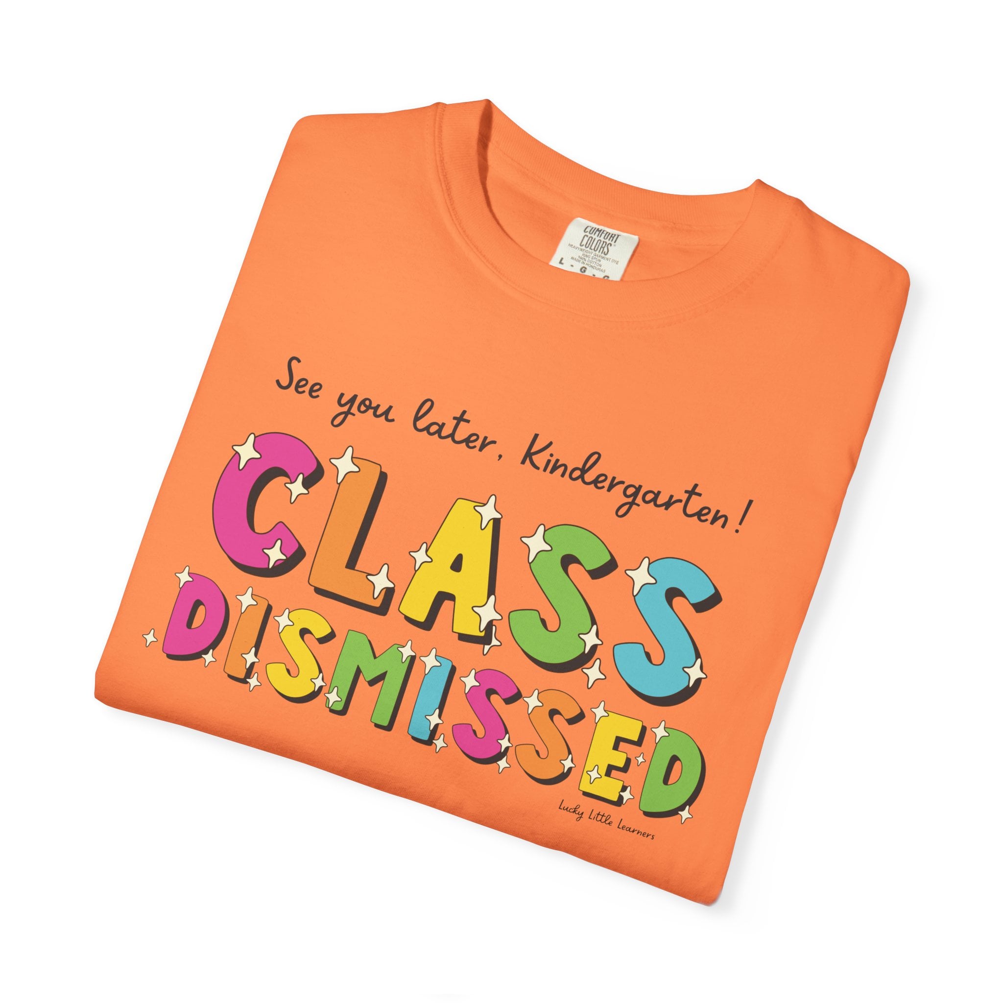 Enjoy your last day of kindergarten with this "Class Dismissed" T-shirt featuring colorful, playful lettering and a fun, celebratory design for young learners.