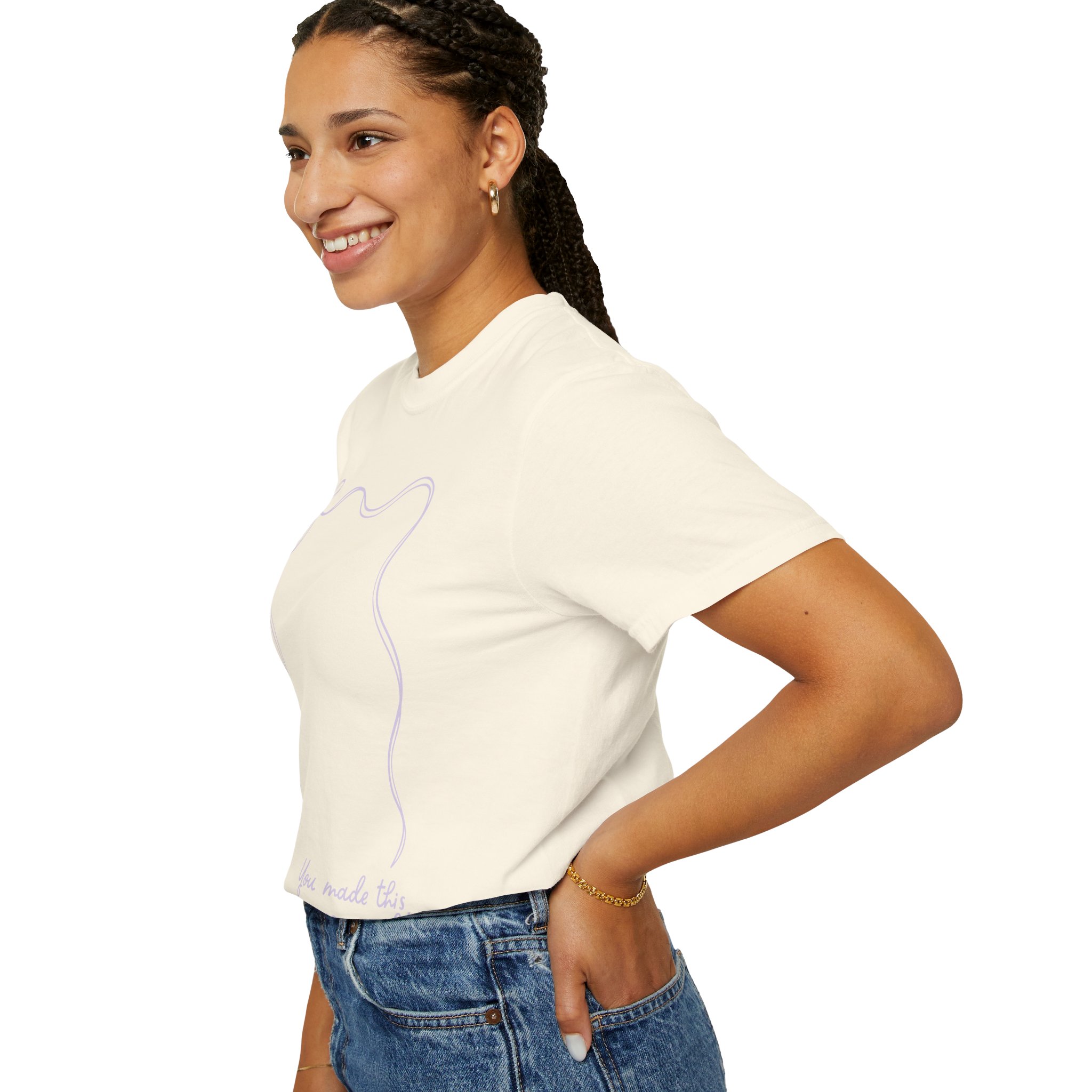 A woman wearing a 2nd grade autograph T-shirt with a teacher-themed design, smiling and standing with her hand on her hip, showcasing a fun and memorable year-end keepsake for educators.