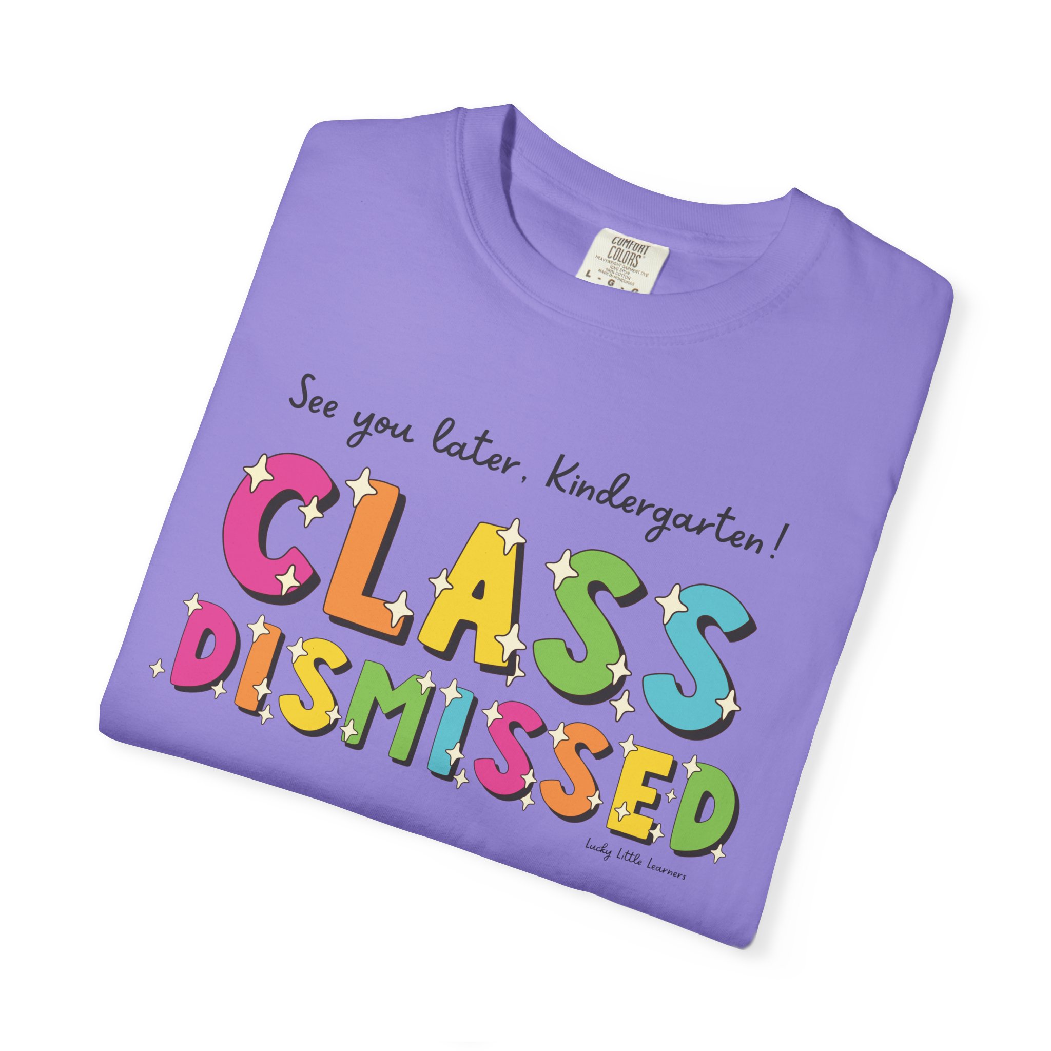 A colorful kindergarten T-shirt with the phrase "Class Dismissed" and "See you later, Kindergarten!" in playful, multicolored letters, perfect for celebrating the end of the school year.